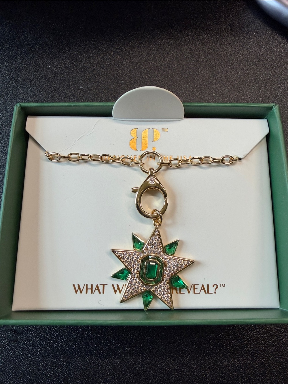 Gold-Tone Starburst Pendant Necklace with Emerald-Green Stones